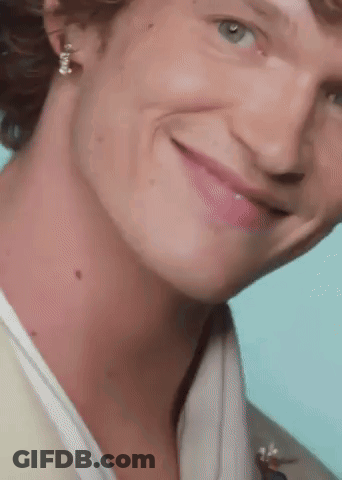 Close Up Smiling Man With Earrings GIF