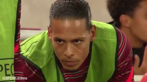 Close Up Soccer Player In Green Vest GIF