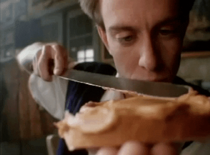 Close Up Spreading Of Peanut Butter GIF