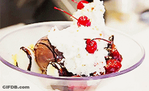 Close Up Sundae With Whipped Cream And Cherry GIF