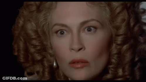Close Up Woman Curly Hair Making Face GIF