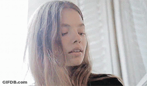 Close-Up Woman Eyes Closed Hair Blowing GIF