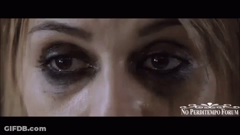 Close Up Woman Eyes With Black Eyeshadow GIF