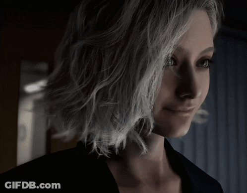 Close-Up Woman Face Dark Background GIF