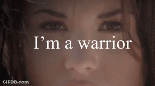 Close Up Woman Face Saying I'm A Warrior GIF