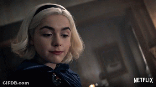 Close Up Woman Face With Netflix Logo GIF