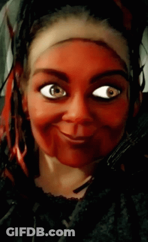 Close Up Woman Face With Red Paint GIF