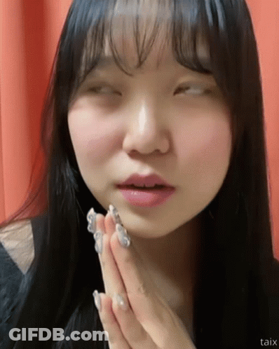 Close Up Woman Face With Taix GIF
