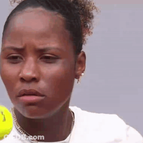 Close Up Woman Face With Tennis Ball GIF