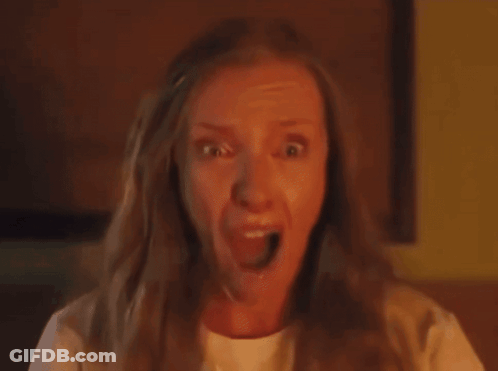 Close Up Woman Face Yellow Background GIF