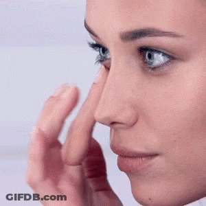 Close Up Woman Finger On Nose GIF