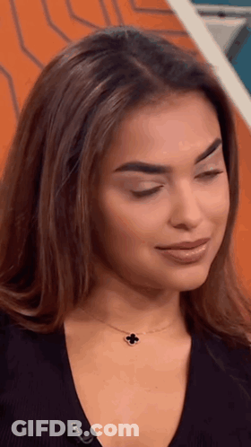 Close Up Woman In Black Sweater GIF
