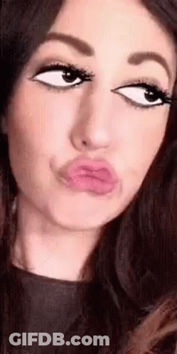 Close Up Woman Making Face With Lips GIF
