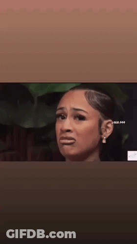 Close Up Woman Making Funny Face With Earrings GIF