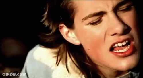 Close Up Woman Mouth Open Slight Smile GIF