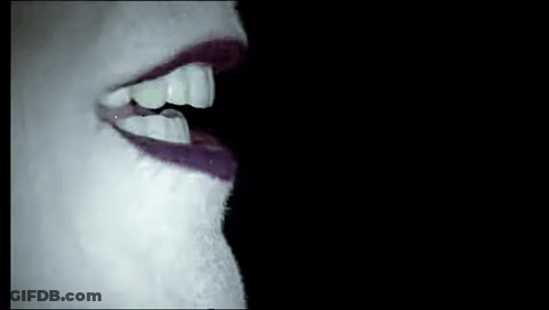 Close Up Woman Mouth Purple Lipstick White Teeth GIF