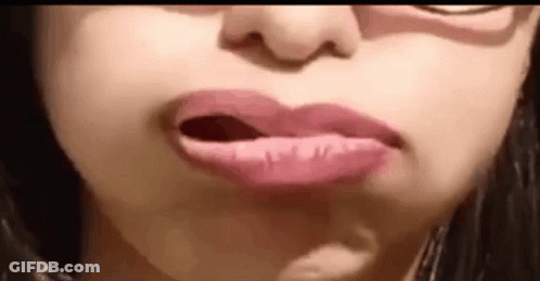 Close Up Woman Mouth With Pink Lipstick GIF