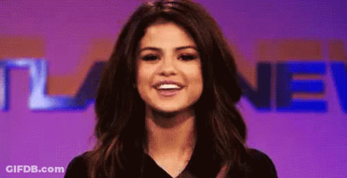 Close Up Woman Purple Background Saying New GIF