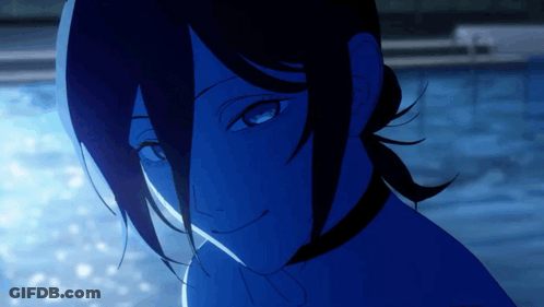 Close-Up Woman's Face Blue Background GIF