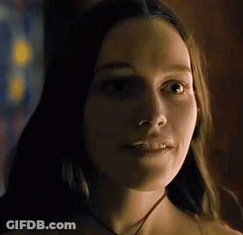 Close Up Woman's Face Dark Room GIF