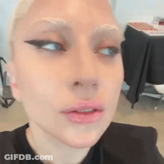 Close Up Woman's Face In Black Shirt GIF