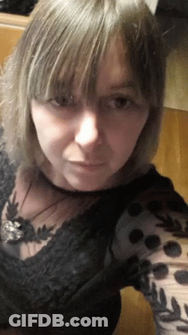 Close Up Woman's Face In Black Shirt GIF