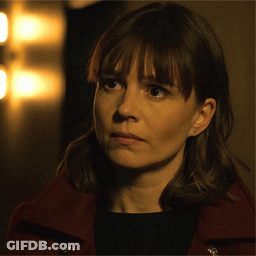 Close Up Woman's Face In Red Jacket GIF