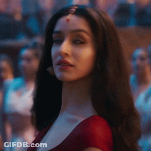 Close Up Woman's Face In Red Top GIF