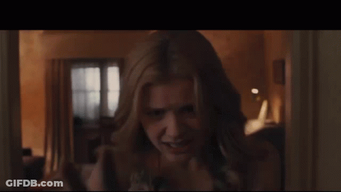 Close Up Woman's Face In Room GIF