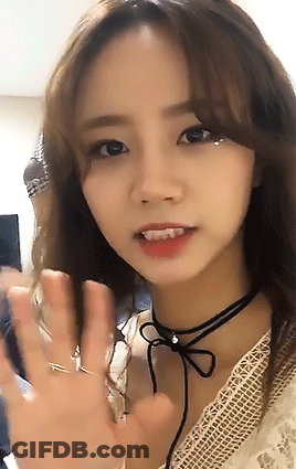 Close Up Woman's Face With Bow GIF