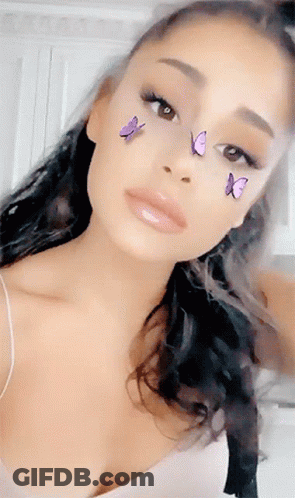 Close Up Woman's Face With Butterflies GIF