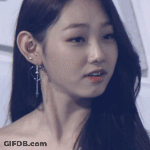 Close Up Woman's Face With Earrings GIF
