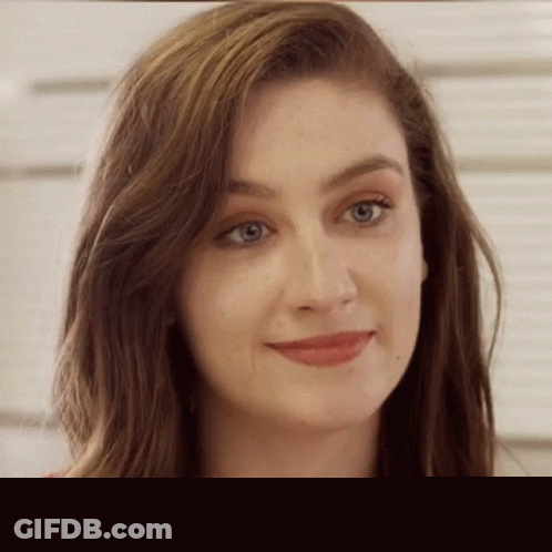 Close Up Woman's Face With Long Hair GIF