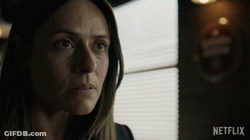 Close Up Woman's Face With Netflix Logo GIF