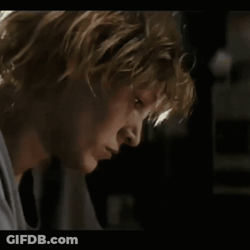 Close Up Woman's Serious Face GIF