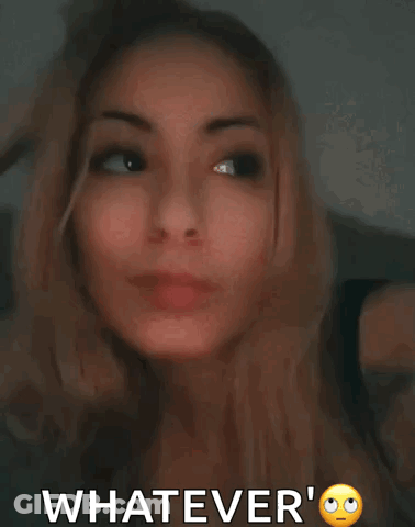 Close Up Woman Saying Whatever GIF