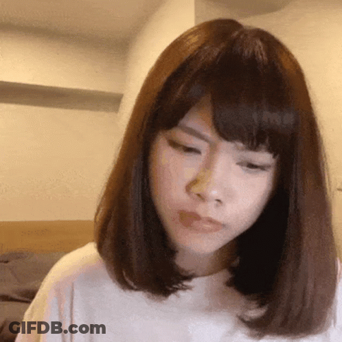 Close-Up Woman Serious Expression GIF
