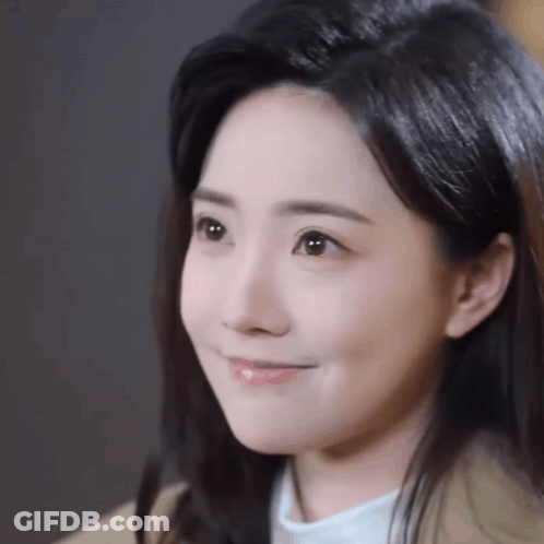 Close Up Woman Smiling At Camera GIF