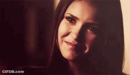 Close Up Woman Smiling At Camera GIF