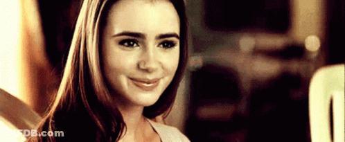 Close-Up Woman Smiling With Long Hair GIF