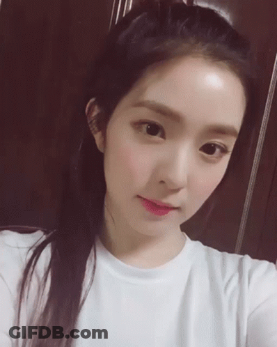 Close-Up Woman Taking Selfie With Hair Bun GIF