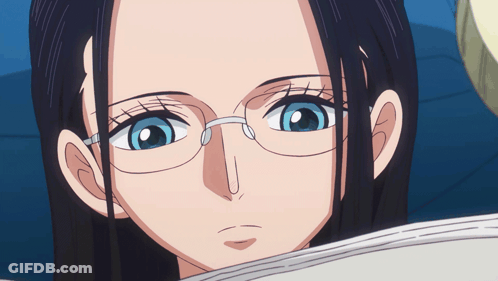 Close Up Woman Wearing Glasses Looking GIF