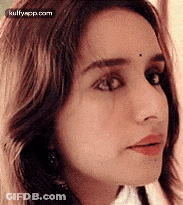 Close Up Woman With Bindi Looking At Camera GIF
