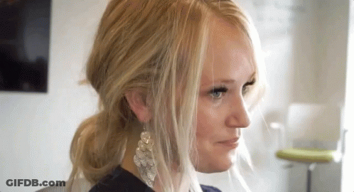 Close Up Woman With Blonde Hair And Earrings GIF
