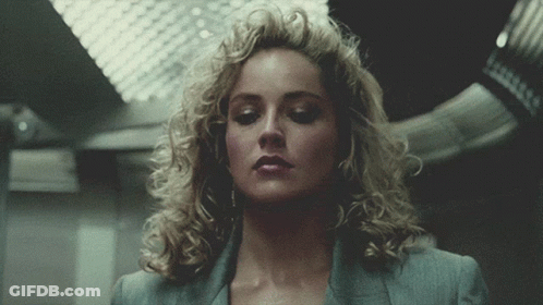 Close Up Woman With Curly Blonde Hair GIF