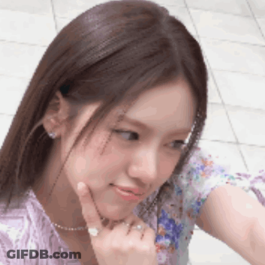 Close Up Woman With Hand On Chin GIF
