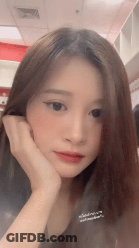 Close Up Woman With Hand On Face GIF