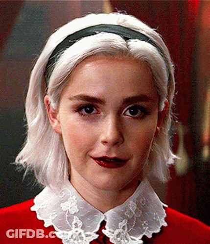 Close Up Woman With Headband And Red Top GIF