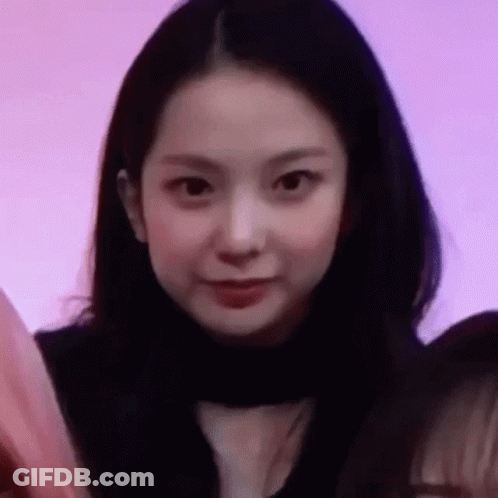 Close Up Woman With Long Black Hair And Purple Background GIF