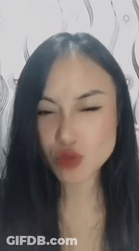Close Up Woman With Long Black Hair GIF